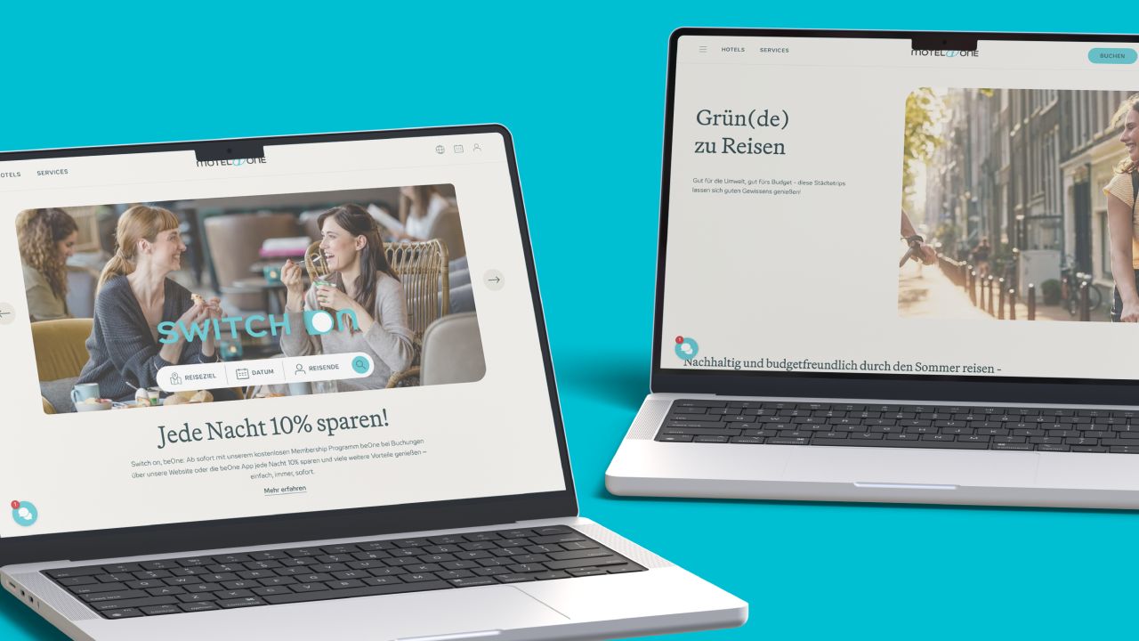 Two laptops on a blue background display the Motel One website with various articles and campaigns Two laptops on a blue background display the Motel One website with various articles and campaigns
