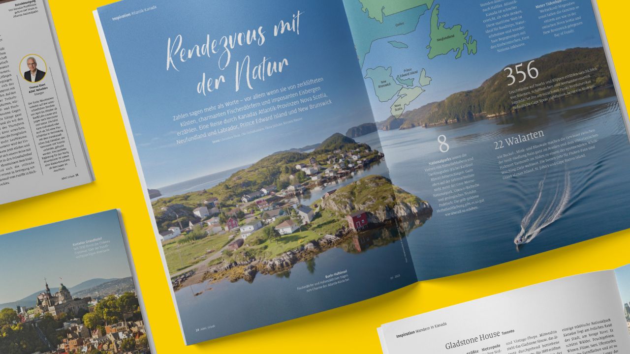 A double-page spread in the travel magazine ADAC Urlaub shows a coastal village in a bay under the headline “Rendezvous with nature.” A double-page spread in the travel magazine ADAC Urlaub shows a coastal village in a bay under the headline “Rendezvous with nature.”