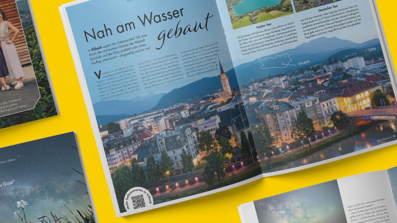 Double page from the ADAC holiday magazine supplement “Best of Austria” shows an evening shot of the city of Villach with the title “Nah am Wasser gebaut” (Built close to the water). Double page from the ADAC holiday magazine supplement “Best of Austria” shows an evening shot of the city of Villach with the title “Nah am Wasser gebaut” (Built close to the water).
